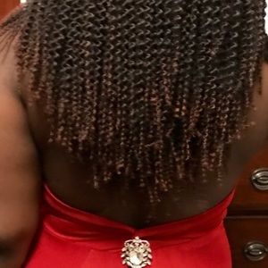 Red prom dress and diamond pin